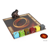 Load image into Gallery viewer, Board game setup with character pieces and a central emblem on a white background