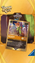 Load image into Gallery viewer, A collectible trading card for Disney's Zootopia character Nick Wilde, featuring a gold border and character artwork, shown against a yellow and orange Hyperia City themed background.